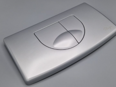 Plieger Main Control Panel DF matchroom a dual flush button for a toilet. Dual flush systems allow for both a full and half flush, saving water. When the button is pressed, a valve is opened, releasing water from the cistern into the toilet bowl. This wat