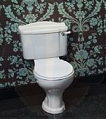 The Shires Abbey Close-Coupled Toilet features a classic design that complements a variety of bathroom styles. It includes a standard close toilet seat and cover, ensuring a comfortable and functional addition to your bathroom suite. The toilet provides r
