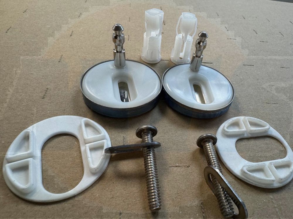 Toilet seat hinges or fixings used for attaching a toilet seat to the pan A996584